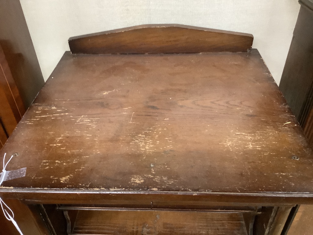 A mid 20th century tambour filing cabinet, width 53cm, depth 47cm, height 130cm